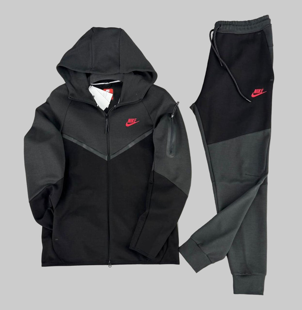 Moška trenirka Nike Tech Fleece, črna in grafitna, s črnimi črtami, žepom na rokavu in rdečim logotipom