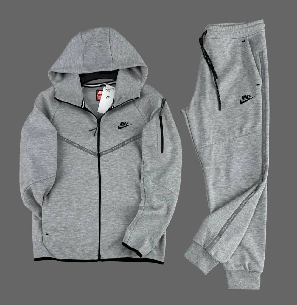 Moška trenirka Nike Tech Fleece, klasično siva, z odsevnimi trakovi in žepom na rokavu