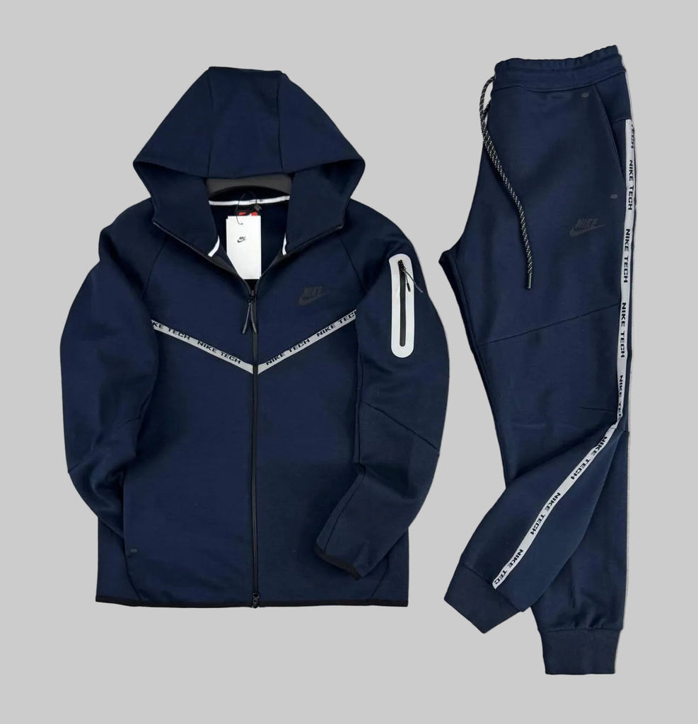 Moška trenirka Nike Tech Fleece, temno modra, z odsevnimi črtami in žepom na rokavu