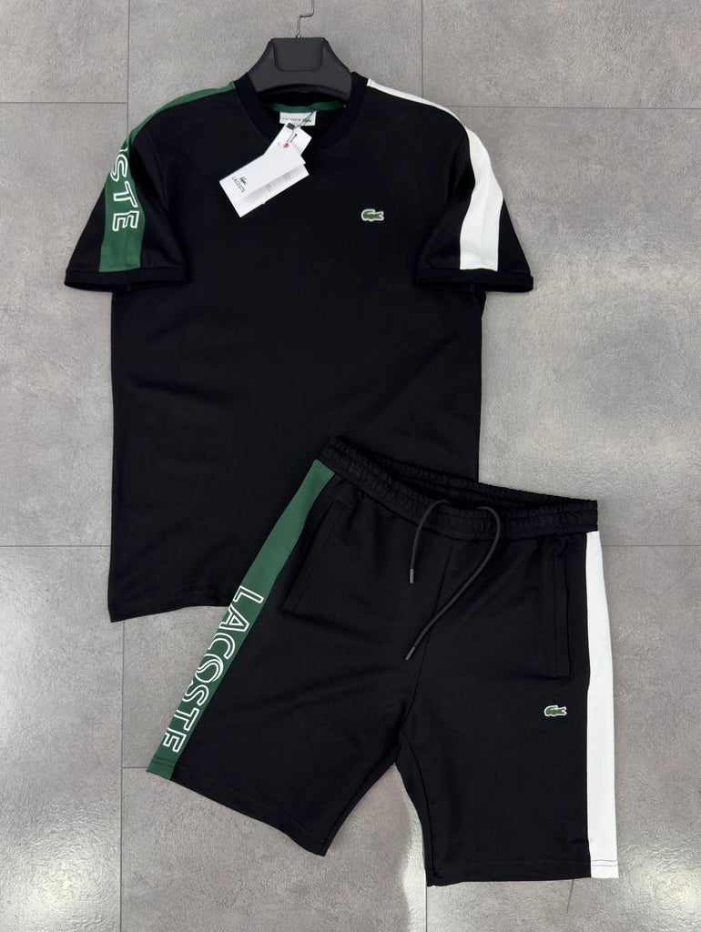 Moški komplet Lacoste, črne barve z belimi in zelenimi elementi. Premium kakovost.
