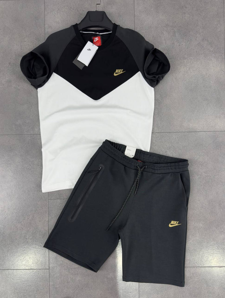 Moški komplet Nike Tech Fleece, bela, črna in grafitna majica ter kratke grafitne hlače. Premium kakovost.