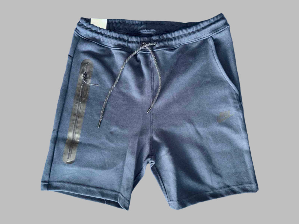 Moške športne kratke hlače Nike Tech Fleece, temno modre barve.